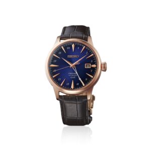 Questa è l'immagine frontale dell'orologio SEIKO presage cocktail gmt con quadrante blu e acciaio rivestito in oro rosa
